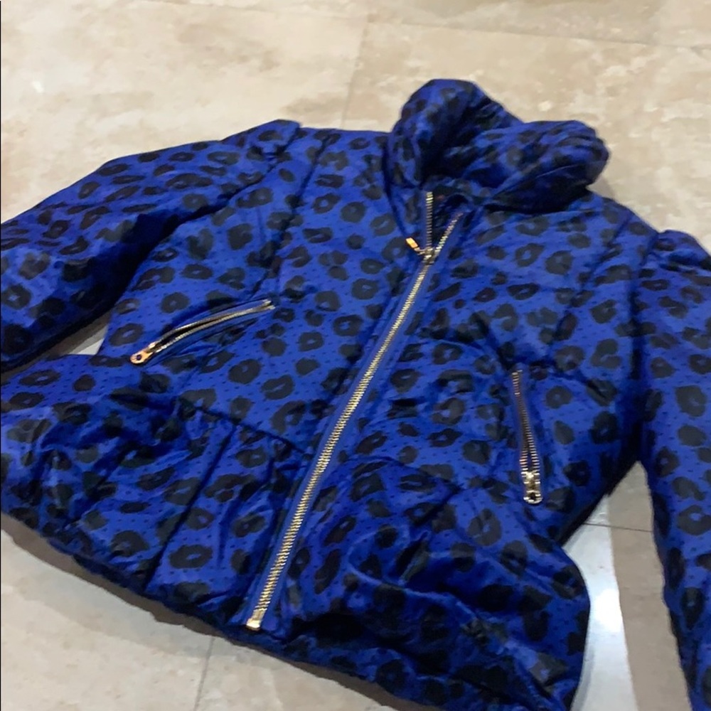 Never worn puffer cheetah jackets!
